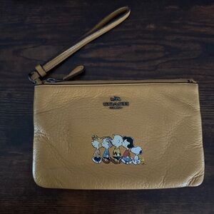 Coach Peanuts Wristlet in Mustard Yellow